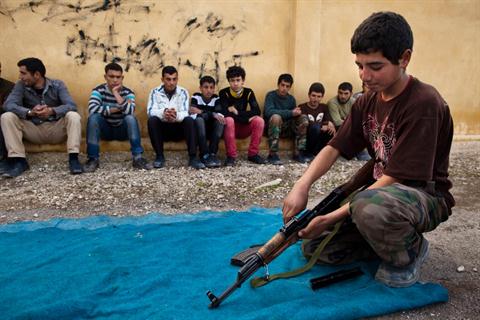 "Academia militar" en Tlaleen en el norte de Siria Aleppo la provincia. AFP PHOTO / JM LÓPEZ